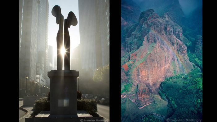 A statue of a man and woman in front of an image.